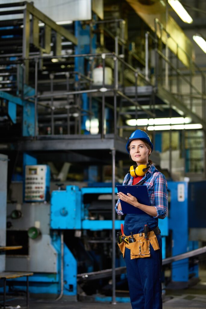 Young Woman Working in Factory