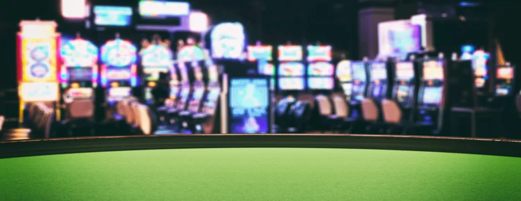 Casino slot machines, green felt roulette table closeup view. 3d illustration